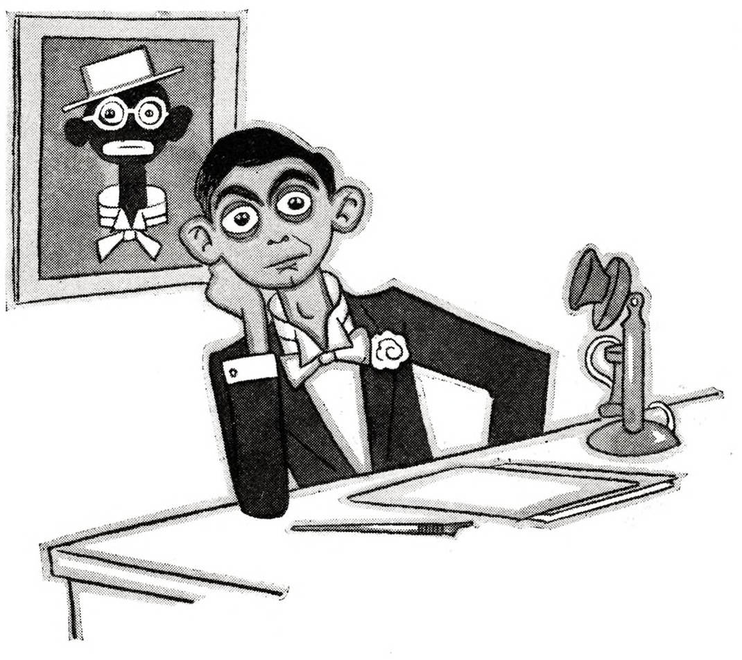 Eddie Cantor sitting at desk